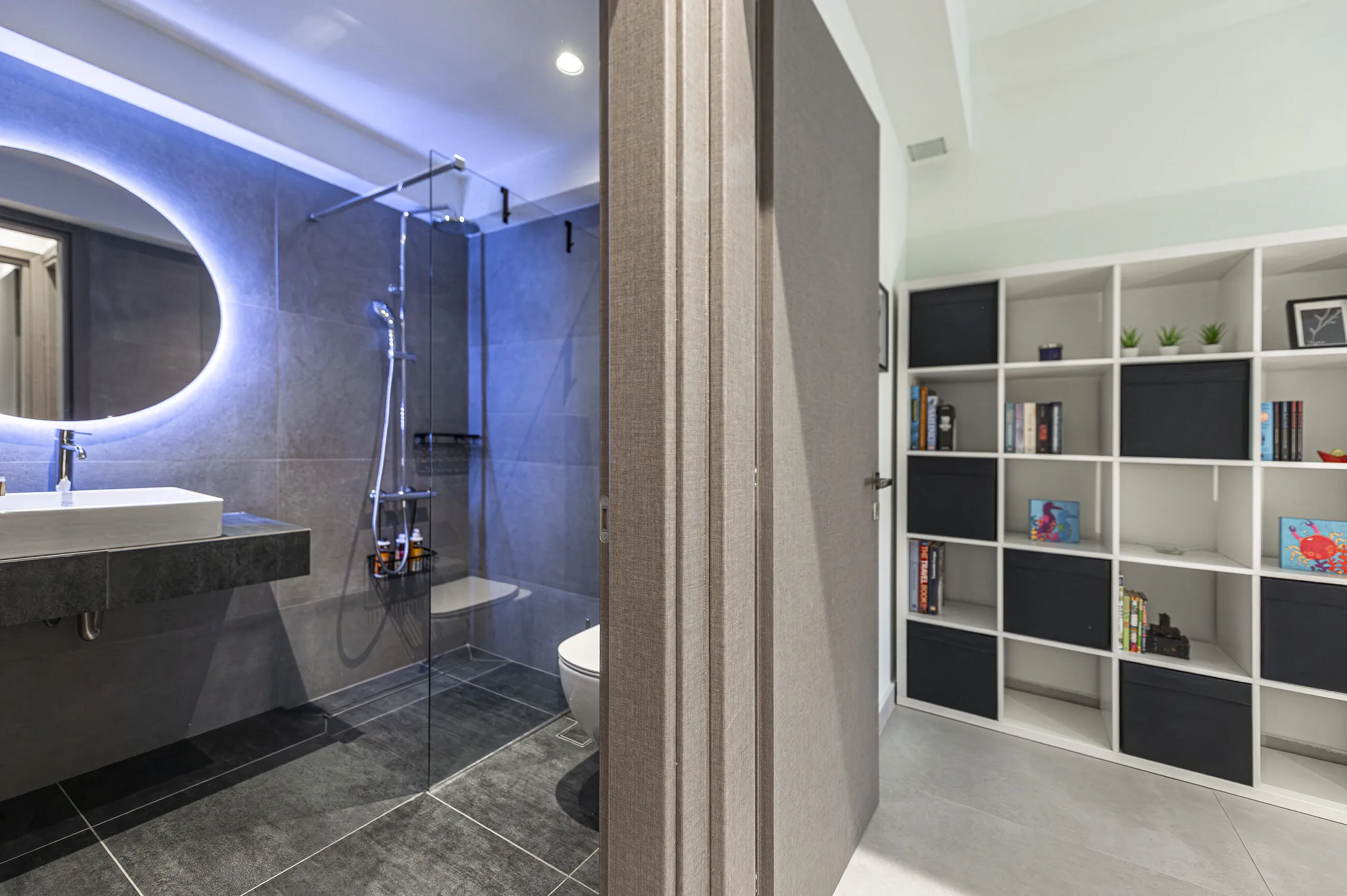 Modern bathroom with walk-in shower and 24/7 hot water