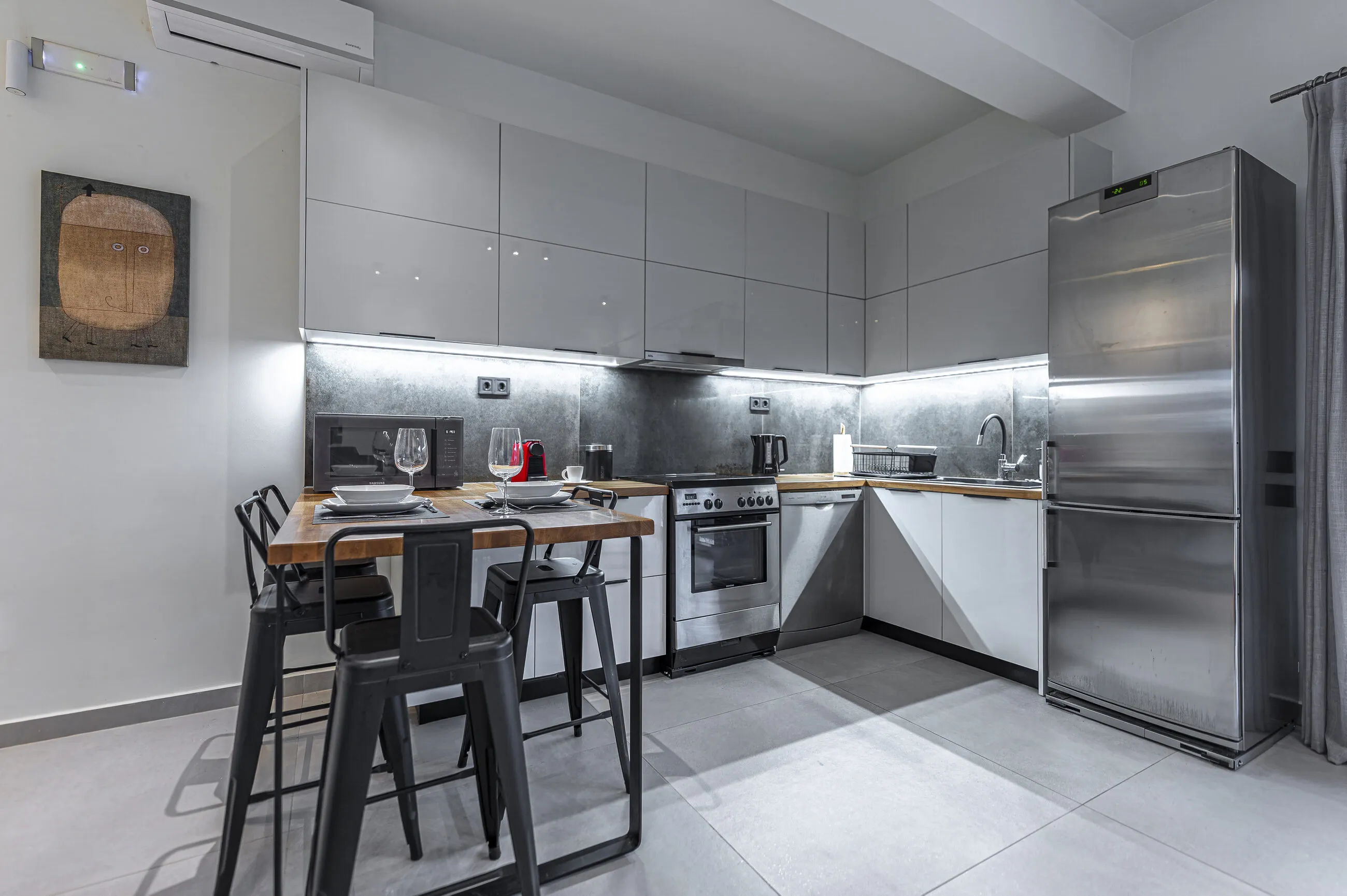 Separate fully equipped kitchen with oven, dishwasher, large fridge-freezer and Nespresso machine