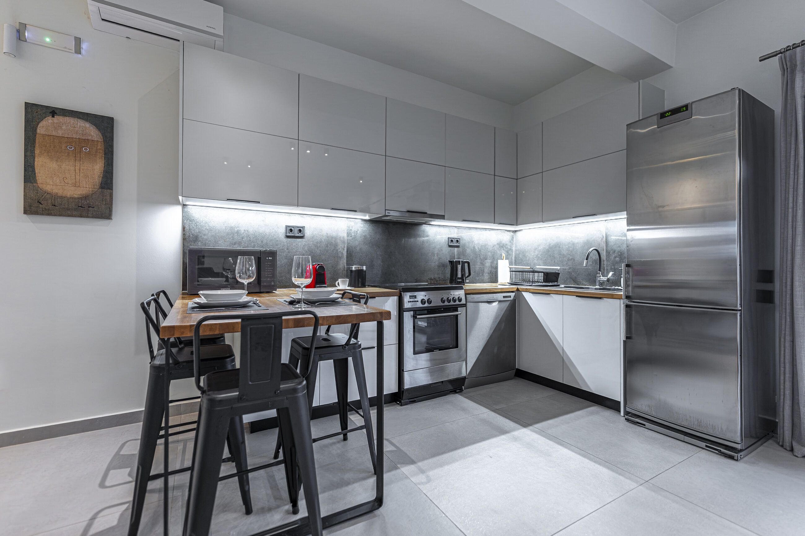 Separate fully equipped kitchen with oven, dishwasher, large fridge-freezer and Nespresso machine