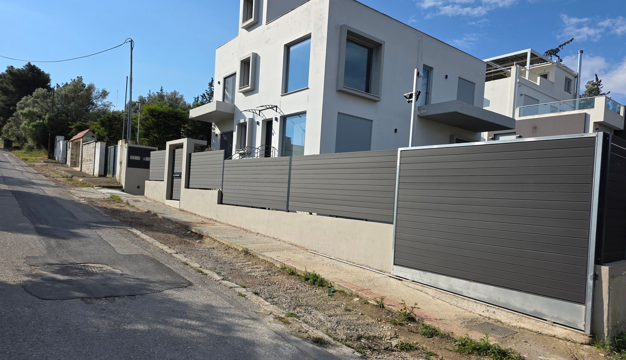 The street in front of the apartment, with free parking right outside the building